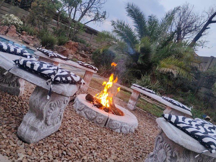 Lit fire pit stones